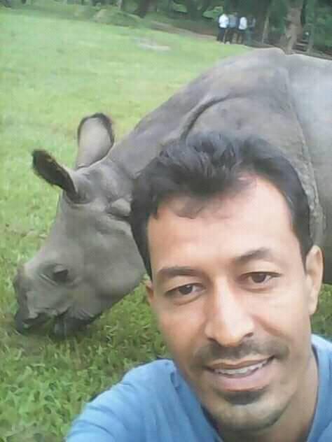 Raj with a wild rhino