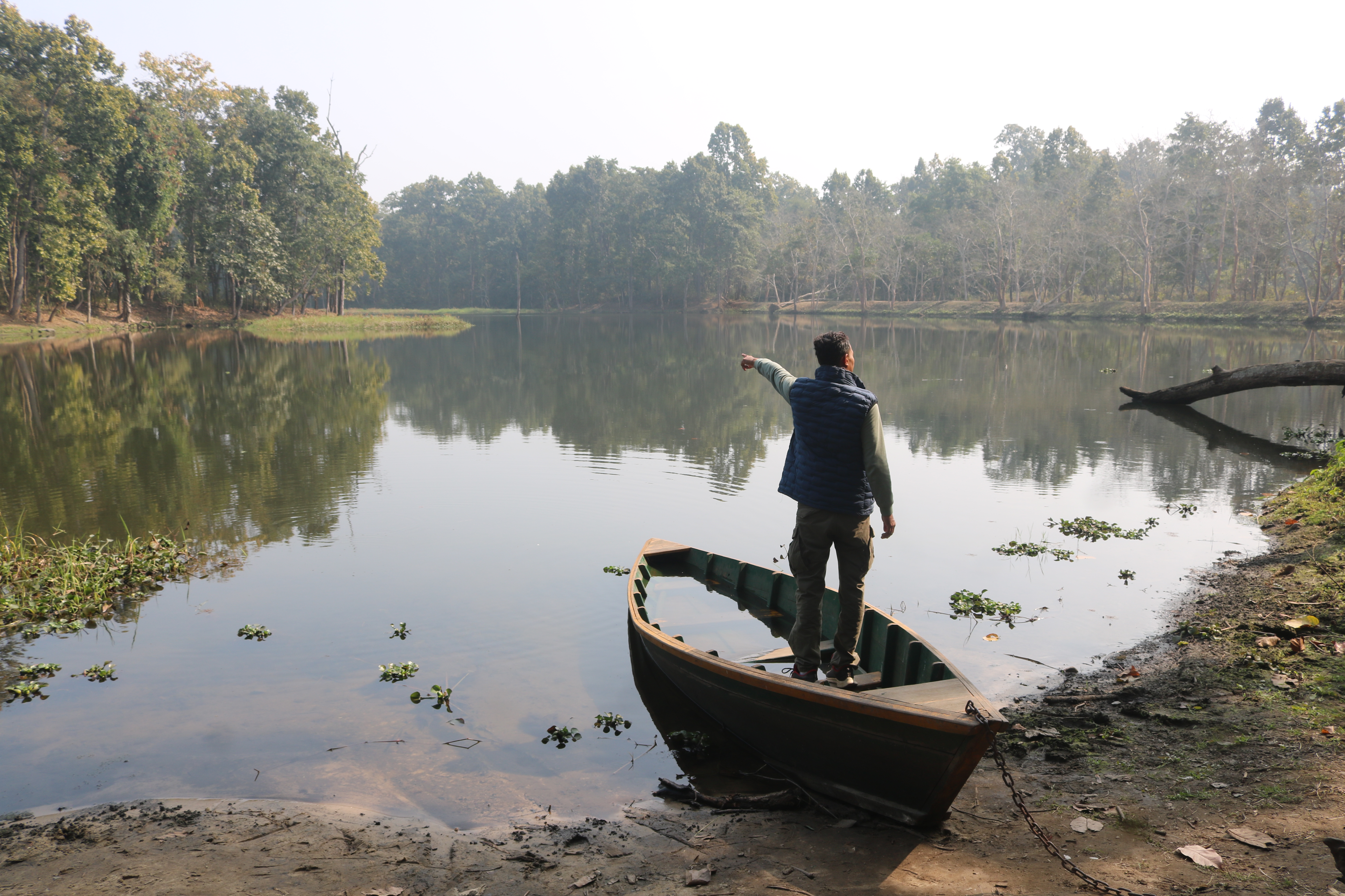 Raj standing on canoe at Twenty Thousand Lakes